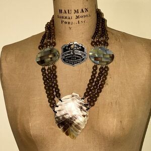 Elegant Brown Wooden Beaded Necklace with Carved Mother of Pearl Leaf Pendant